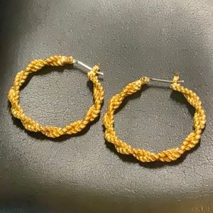 Twisted rope hoop earrings gold tone color